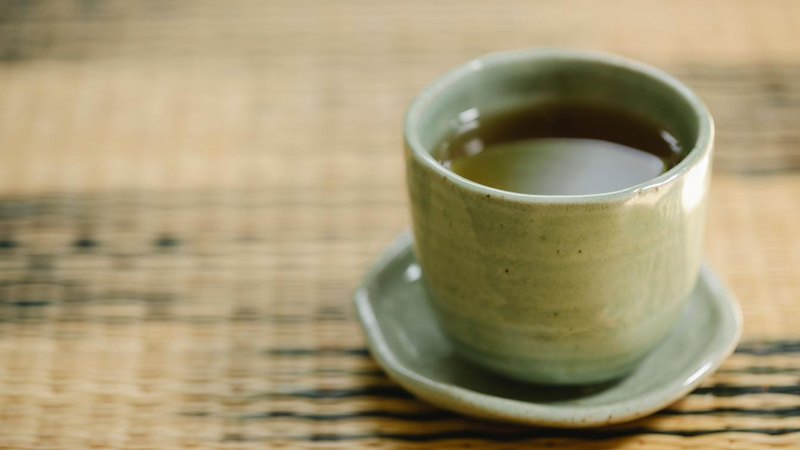 A Japanese tea cafe table with food