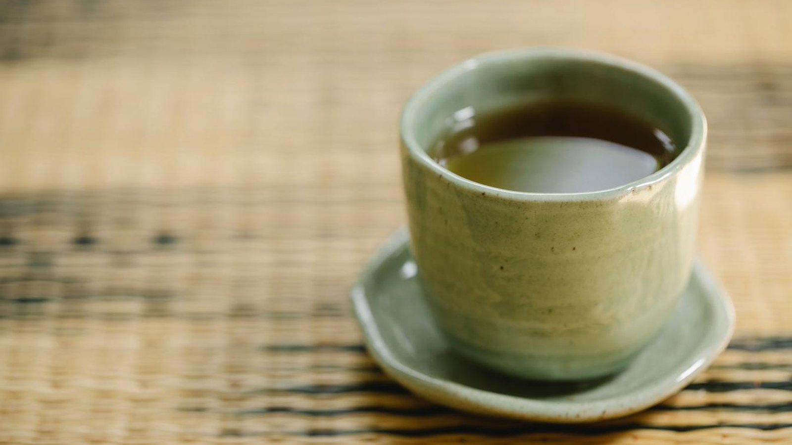 A Japanese tea cafe table set with tea and food