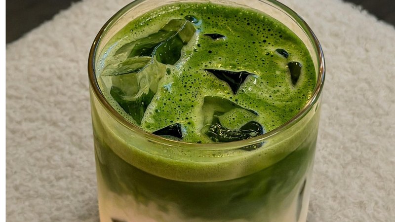 An iced matcha latte to go