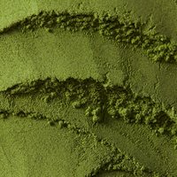 Tin of ceremonial-grade matcha powder